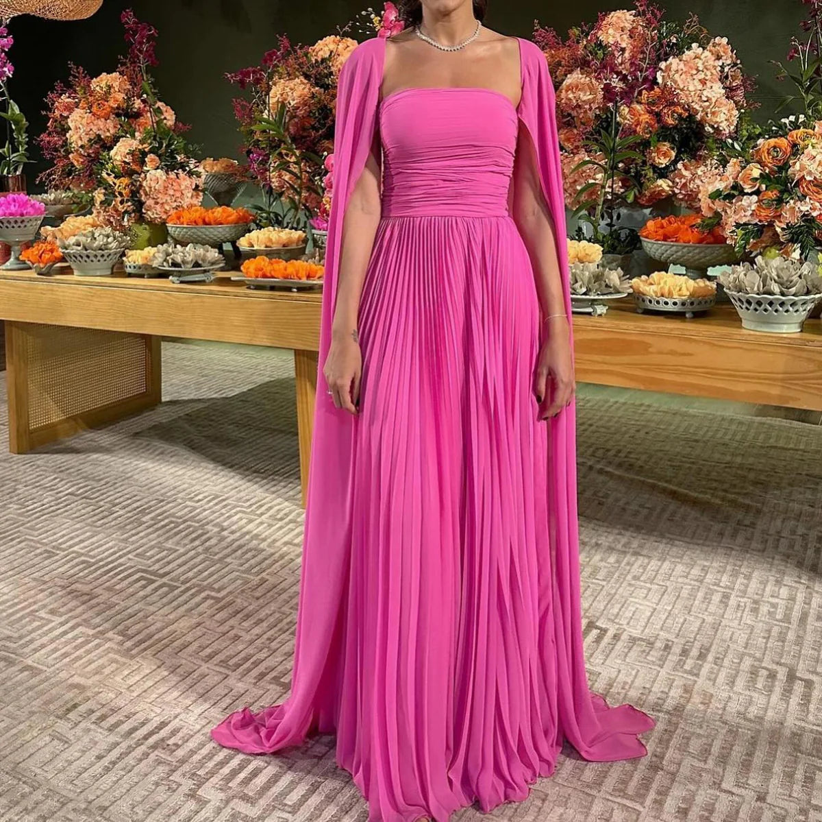 Robe rose plissée