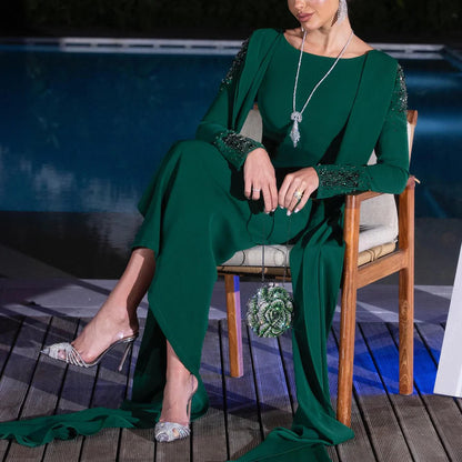 Robe de soirée vert émeraude avec cape et broderies